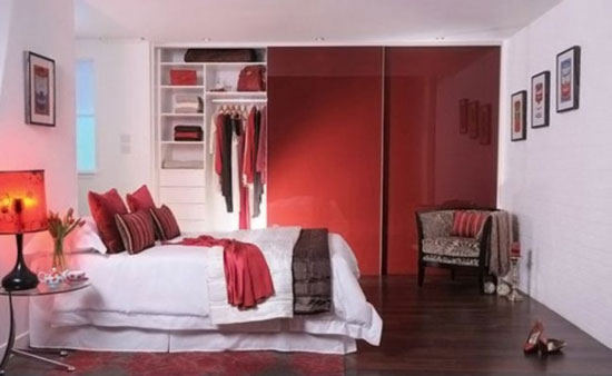 he-red-glossy-glass-door-makes-an-elegant-design-for-a-wall-when-the-closet-is-not-in-use-915x563