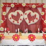Фото 18: Оформление стола жениха с невестой шарами